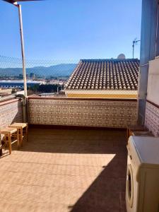 Balkón nebo terasa v ubytování Piso con encanto