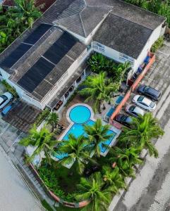 A piscina localizada em Pousada Toca da Praia ou nos arredores