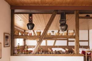 a shelf with baskets and bottles on a table at Hotel Andino Club - Hotel Asociado Casa Andina in Huaraz