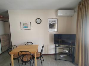 TV a/nebo společenská místnost v ubytování Laguna Beach Torrox Costa + 25 fotografií