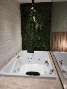 Ett badrum på HOTEL KICHARME PONTAL