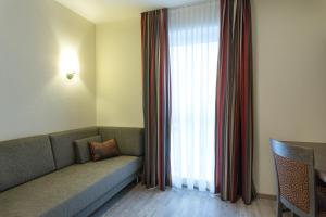 Posezení v ubytování CityApart Hotel