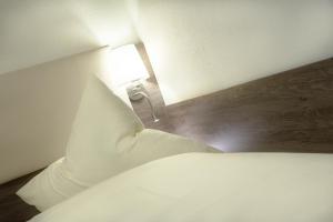 Postel nebo postele na pokoji v ubytování CityApart Hotel
