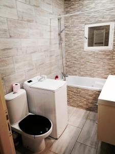 Ванная комната в Maisonnette proche de Lyon