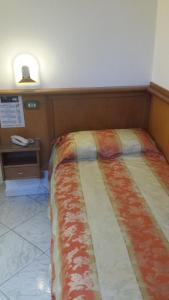 Voodi või voodid majutusasutuse Hotel Lorena toas