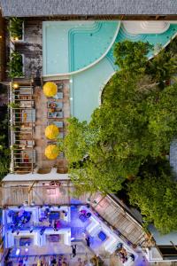 an overhead view of a resort with a pool and trees at Café Jeri Hotel in Jericoacoara