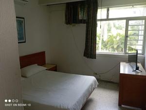Postel nebo postele na pokoji v ubytování Hotel Albatros