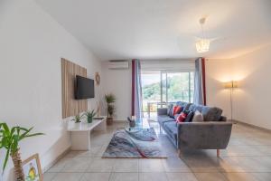 Posedenie v ubytovaní Appartement cosy et spacieux avec jardin et parking