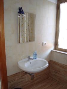Kylpyhuone majoituspaikassa B&B Casa Ferrara