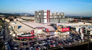 an overhead view of a city with a parking lot at KLIA AIRPORT HOMESTAY 3 in Sepang