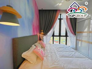 Voodi või voodid majutusasutuse Legoland D'PRISTINE Apartment By TGP toas