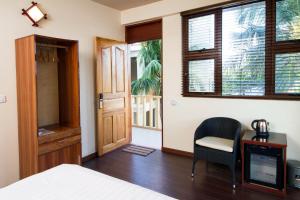 Tropic Tree Maldives客房内的一张或多张床位