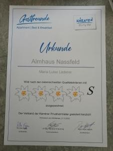 Certificato, attestato, insegna o altro documento esposto da Almhaus Nassfeld