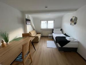 Postel nebo postele na pokoji v ubytování Apartment Q im Zentrum von Königsbronn