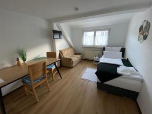 Postel nebo postele na pokoji v ubytování Apartment Q im Zentrum von Königsbronn
