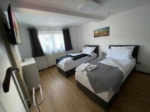 Postel nebo postele na pokoji v ubytování Apartment Q im Zentrum von Königsbronn