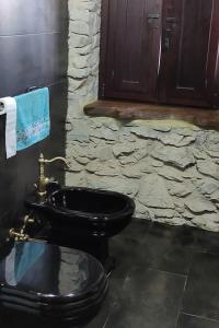 Ένα μπάνιο στο TRASANNA Casa in Pietra