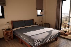 Letto o letti in una camera di 舊事民宿 Old things in quemoy