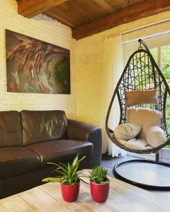 Khu vực ghế ngồi tại Grote Goesting holiday house