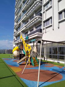a playground in front of a building at D'MEDINA @ Icon Residence in Kuala Terengganu