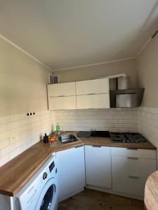 Kuchyňa alebo kuchynka v ubytovaní Abra IV Apartament