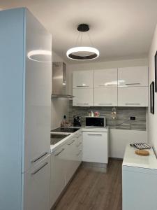 Kuchyň nebo kuchyňský kout v ubytování Regis B&B Appartamenti centro storico