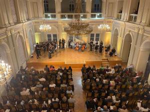 an overhead view of a concert in a large building at OAK COTTAGE in Maruševec