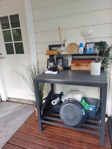 a table on the porch of a house at Arolahti Suite ( Rapojärvi ) in Kouvola +29 photos