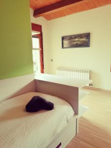 Postel nebo postele na pokoji v ubytování Cal Lledoner
