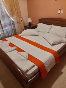 Posteľ alebo postele v izbe v ubytovaní Vassilis Apartments