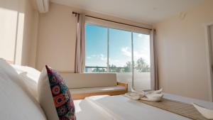 Postel nebo postele na pokoji v ubytování Lea Spa Hotel