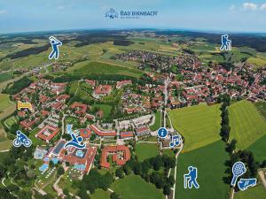 an aerial view of a city with buildings and arrows at Appartementhaus Viktoria in Bad Birnbach