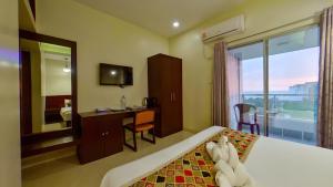 TV a/nebo společenská místnost v ubytování Hotel Sea Cox + 33 fotografií