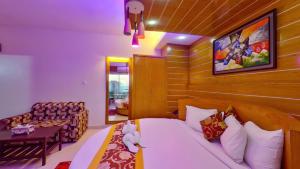 Postel nebo postele na pokoji v ubytování Hotel Sea Cox