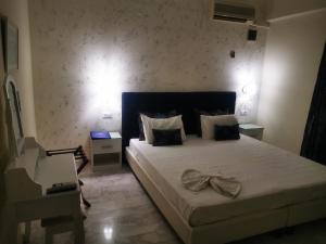 Posteľ alebo postele v izbe v ubytovaní Vlycha Beach Apartments