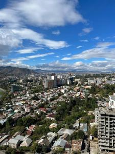 a cityscape of a city with houses and buildings at Hotel Babi in Tbilisi City