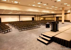 a large room with chairs and a podium in it at Hotel Bourbon Ibirapuera Suite 5 estrelas Moema in São Paulo +18 photos