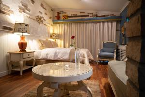 Część wypoczynkowa w obiekcie Paul's Fantasia Boutique Suites