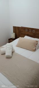 En eller flere senge i et værelse på Cabañas Bry