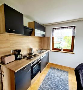 Kuchyň nebo kuchyňský kout v ubytování Ferienwohnung St. Josef