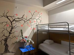 Postel nebo postele na pokoji v ubytování Arkadia Hotel & Hostel