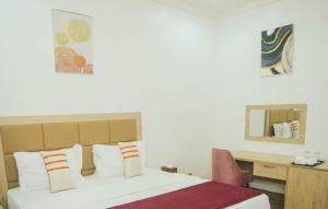 Postel nebo postele na pokoji v ubytování Quest Boutique Hotel
