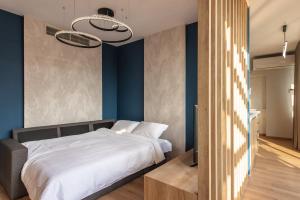 Ein Bett oder Betten in einem Zimmer der Unterkunft Ethereal Athεns