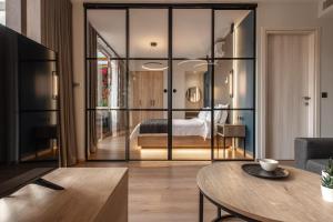 Ein Bett oder Betten in einem Zimmer der Unterkunft Ethereal Athεns