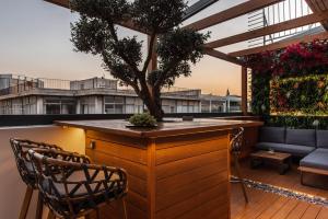 Ein Balkon oder eine Terrasse in der Unterkunft Ethereal Athεns