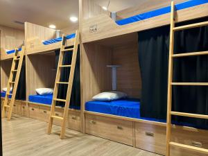 a bunk bed with two bunk beds in a room at Albergue GBC Hostel in Pontevedra