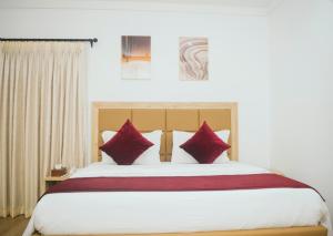 Postel nebo postele na pokoji v ubytování Quest Boutique Hotel