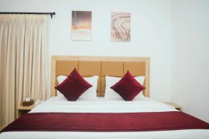 Postel nebo postele na pokoji v ubytování Quest Boutique Hotel