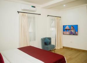 Postel nebo postele na pokoji v ubytování Quest Boutique Hotel