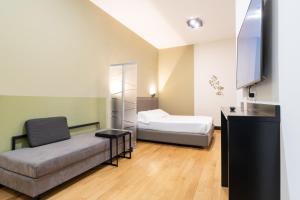 Postel nebo postele na pokoji v ubytování Castello Guest House Milano